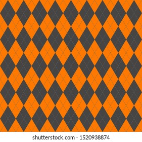 Halloween Argyle plaid. Scottish pattern in orange and grey  rhombuses. Scottish cage. Traditional Scottish background of diamonds . Seamless fabric texture. Vector illustration