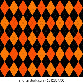 Halloween Argyle plaid. Scottish pattern in orange and black rhombuses. Scottish cage. Traditional Scottish background of diamonds . Seamless fabric texture. Vector illustration