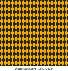 Halloween Argyle plaid. Scottish pattern in yellow and black rhombuses. Scottish cage. Traditional Scottish background of diamonds . Seamless fabric texture. Vector illustration