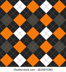 Halloween Argyle plaid. Scottish pattern in orange, black and gray rhombuses. Scottish cage. Traditional Scottish background of diamonds. Seamless fabric texture. Vector illustration