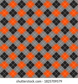 Halloween Argyle plaid. Scottish pattern in orange, black and gray rhombuses. Scottish cage. Traditional Scottish background of diamonds. Seamless fabric texture. Vector illustration