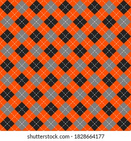 Halloween Argyle plaid. Scottish pattern in orange, black and gray rhombuses. Scottish cage. Traditional Scottish background of diamonds. Seamless fabric texture. Vector illustration