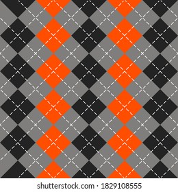 Halloween Argyle plaid. Scottish pattern in orange, black and gray rhombuses. Scottish cage. Traditional Scottish background of diamonds. Seamless fabric texture. Vector illustration