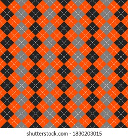 Halloween Argyle plaid. Scottish pattern in orange, black and gray rhombuses. Scottish cage. Traditional Scottish background of diamonds. Seamless fabric texture. Vector illustration
