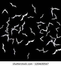 Halloween background with bats on black. Halloween party card background template. Flying bats.
