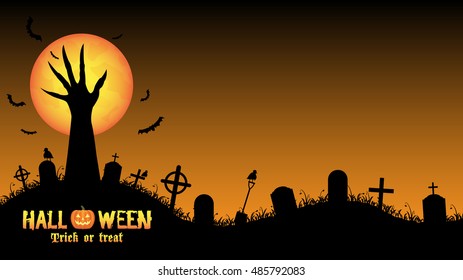 Halloween background with demon hand in graveyard 