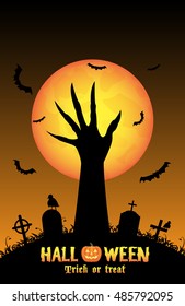 Halloween background with demon hand in graveyard 