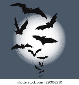 Halloween background - flying bats in full moon