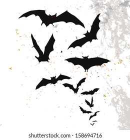 Halloween background with a full moon and bats