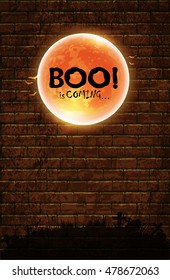 Halloween background with old brick wall and a silhouette of cemetery