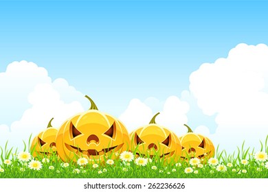 Halloween background with pumpkins flowers and grass