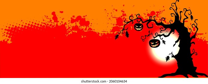 Halloween background with pumpkins and lone Tree