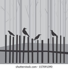 Halloween background with ravens on fence