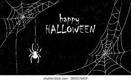Halloween background. Spider web and spiders on a dark background. Copy space. Festive background
