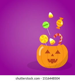 Halloween background. Trick or treat card. Pumpkin basket full of candies.