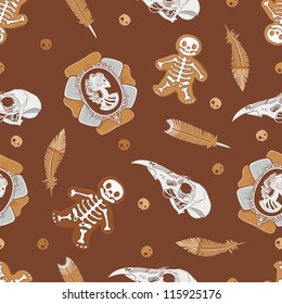 Halloween background with vintage brooch, skulls, cookies and  feathers