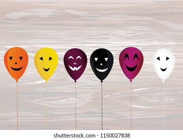 Halloween. Balloons with faces for a holiday, birthday and a party. Multicolored inflatable balls. Complimentary ticket. Free space for text or text. Vector on wooden background.