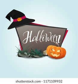 Halloween. Banner with pumpkins and a witch hat