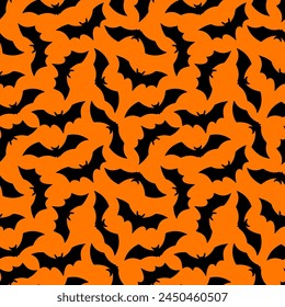 Halloween Bat flat seamless pattern. Vector Happy Halloween print with flying black bat silhouette on orange background. For wrapping, fabric, holiday decoration, textile, wallpapers