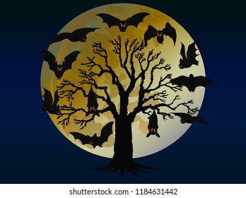 Halloween bat at tree in front of the moon