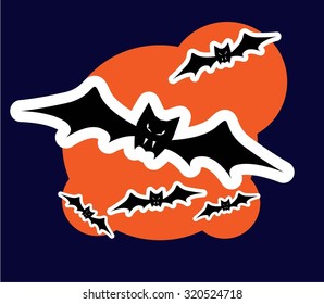 Halloween bats on orange moon background