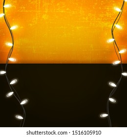 Halloween blank template for your arts with copy space. Square template with garland lights on orange old scratched  and dark background 
