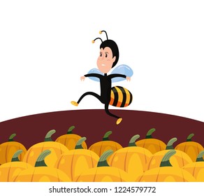 halloween boy in costume bee pumpkins party