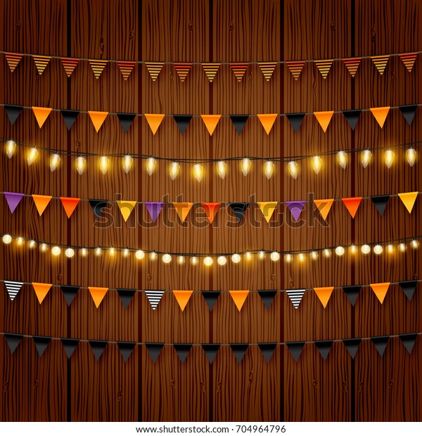 Halloween buntings and shiny lights vector set.\
Black and orange festive decorative halloween party flags and light\
chains.