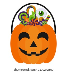 Halloween Candy Bucket and Candies - Jack O Lantern Halloween candy bucket with handle holding many colorful Halloween candies isolated on white background