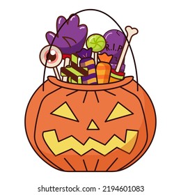 Contenedor de dulces de Halloween en forma de calabaza. Calabaza naranja con boca cortada y ojos llenos de dulces.