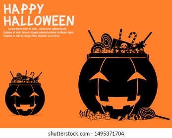 Halloween candy in the pumpkin bucket
