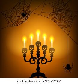 Halloween card with candle light and spider webs