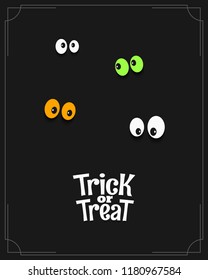 halloween card with eyes and "Trick or treat" lettering on black background