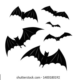 Halloween cartoon bats flying. All Saints' Eve black vector illustration for emblem or logo badge banner poster or t-shirt on a white background. A flock of scary night animals