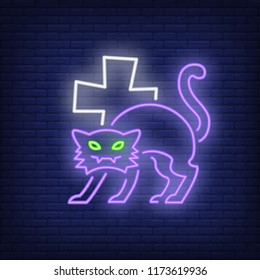 Halloween cat neon icon. Spooky character cross shape on brick wall background. All Hallows eve concept. Vector illustration can be used for street wall signs, party announcements, celebration design
