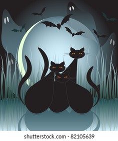 Halloween cats, bats and ghosts by moonlight