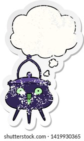 halloween cauldron cartoon with thought bubble as a distressed worn sticker