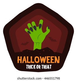 Halloween celebration badge, label or logo with green zombie hand sticking from graveyard cemetery ground isolated