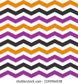 Halloween Chevron Seamless Pattern. Black, orange, violet and white zig zag design