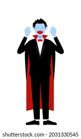 Halloween costume, a man dressed as a vampire poses with his hands in the air to surprise