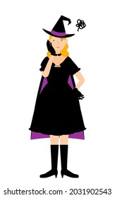 Halloween costume, a woman dressed as a witch poses with her hands on her cheeks in distress