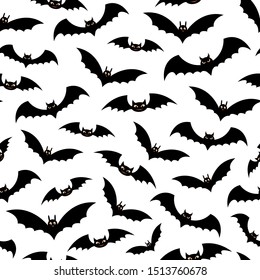 Halloween decorative seamless pattern. Flying bats on white backdrop. Holiday design for party decorations.