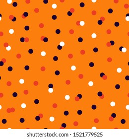 Halloween dots seamless pattern. Orange dots seamless pattern. Confetti orange pattern.