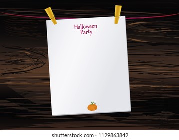 Halloween. Empty blank invitation for a party with a pumpkin hanging on clothespins. Vector on wooden background. The Feast of October and Autumn.