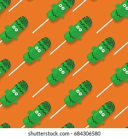 Halloween festive seamless pattern with cream cakes. Vector illustration with cream cakes in the form of frankenstein. Top view on sweets on orange backdrop.