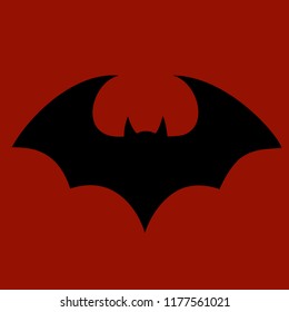 Halloween flying bat.  Vampire vector bat. Dark silhouette of bat flying in a flat style