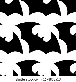 Halloween flying bat.  Vampire vector bat. Dark silhouette of bats flying in a flat style. Seamless pattern. Halloween background.
