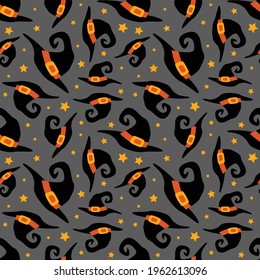 Halloween funny wizard hat and stars seamless pattern. Vector illustration.