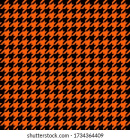 Halloween goose foot. Pattern of crow's feet in black and orange cage. Glen plaid. Houndstooth tartan tweed. Dogs tooth. Scottish checkered background. Seamless fabric texture. Vector illustration