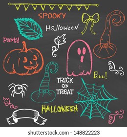 Halloween hand drawing doodles on chalkboard